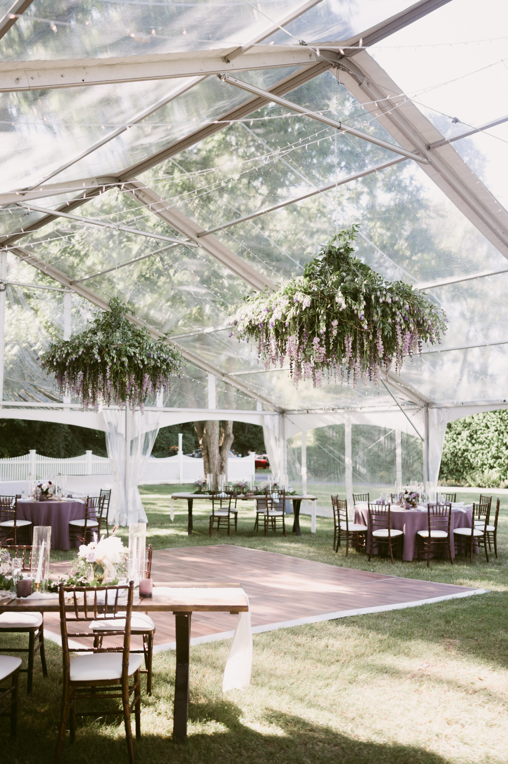 private estate lake wedding black swan floral design chandelier