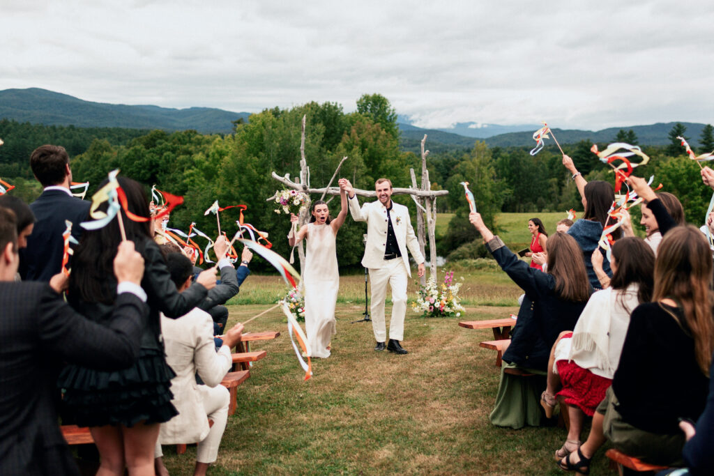 Couple celebrating their wedding at Bliss Ridge, Assorted Artistries Vermont Wedding Planner